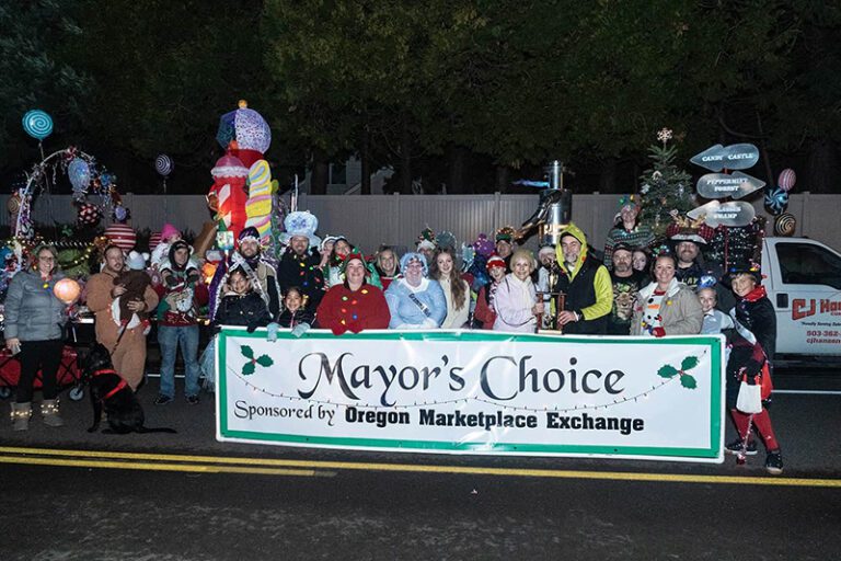 CJ Hansen wins the “Mayor’s Choice” award at the Keizer Holiday Lights Parade