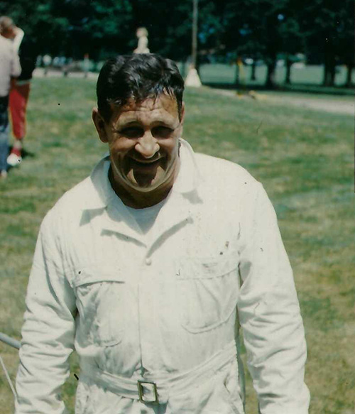 Gene Rawlings in work gear standing in a park